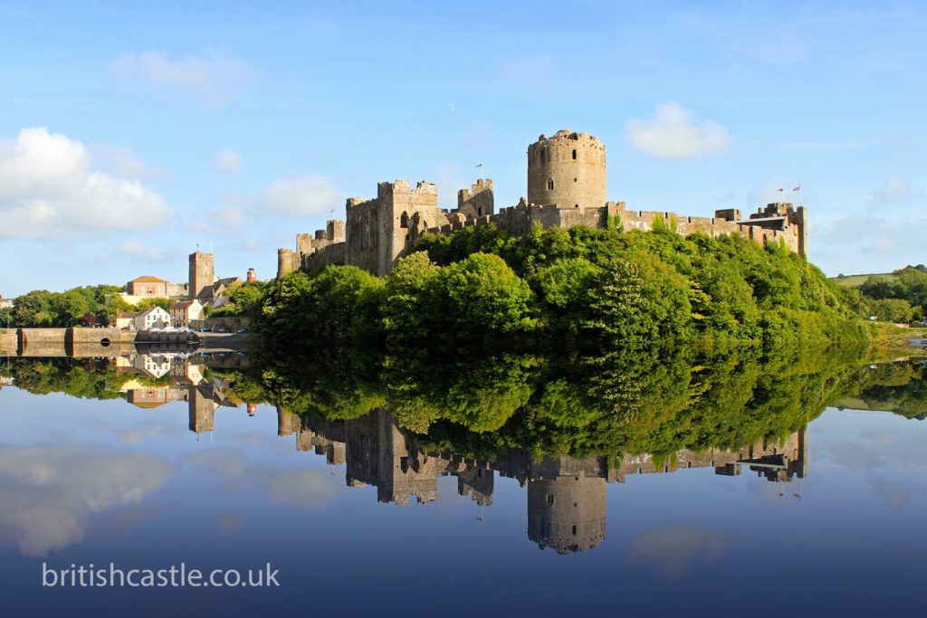 Pembroke castle reflected in the water