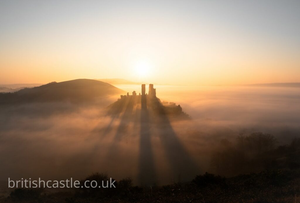 Misty sunrise over Corfe Castle